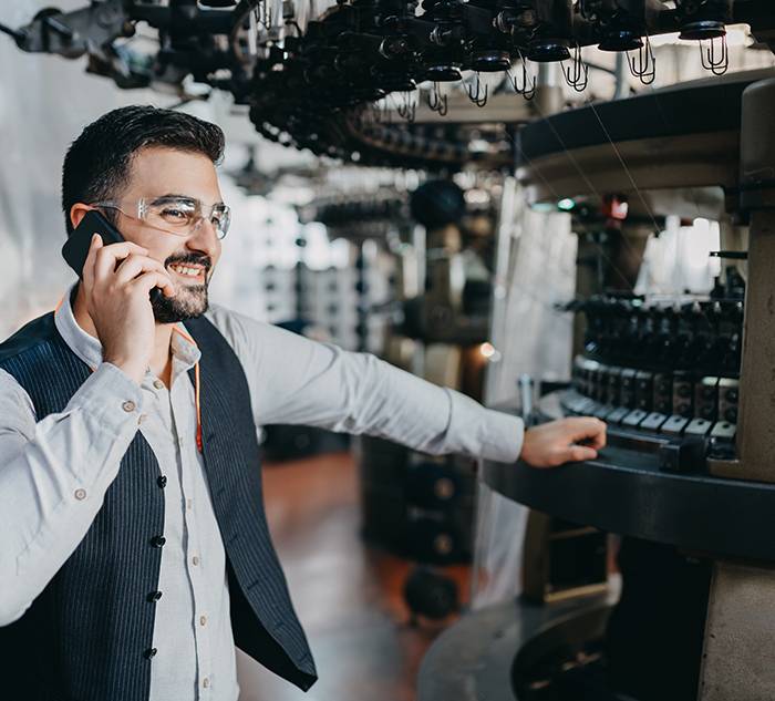 Small Business owner having conversation with his customer