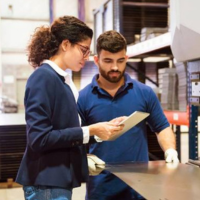 two people talking about metal sheet fabrication