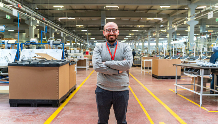 Portrait of employee on the shop floor